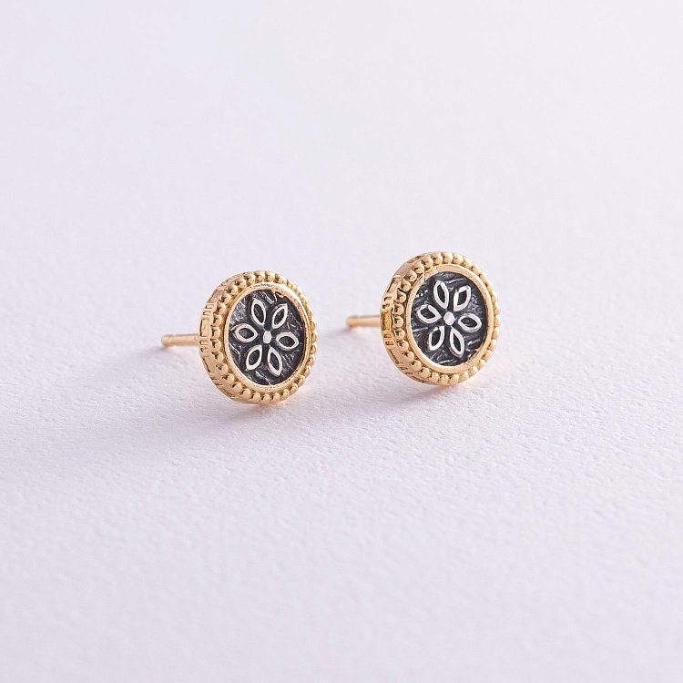 Сережки - пусети "Квіточки" в сріблі (позолота, чорніння) 122773 від ювелірного магазину Онікс