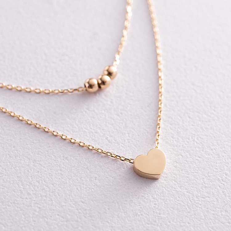 Двойное золотое колье "Шарики и сердечко" кол02301 от ювелирного магазина Оникс - 1