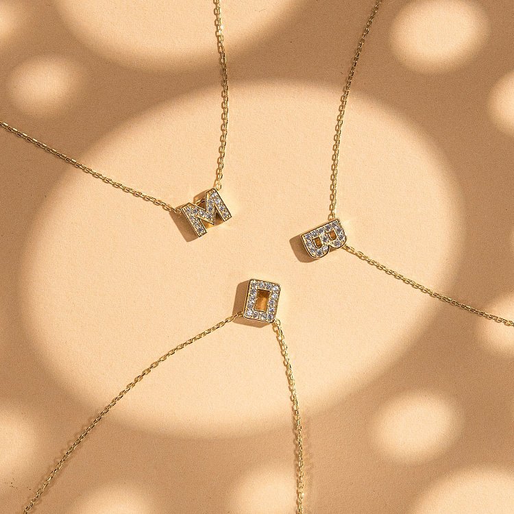 Кольє з буквою "Т" в жовтому золоті (фіаніти) кол01165Т від ювелірного магазину Онікс - 9