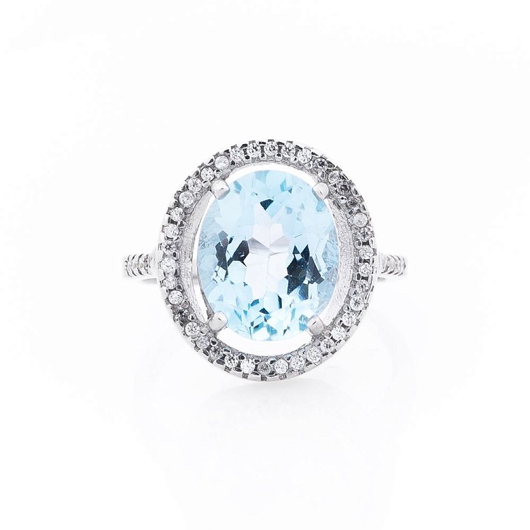 Срібний перстень з блакитним топазом і фіанітами 111517 від ювелірного магазину Онікс - 2