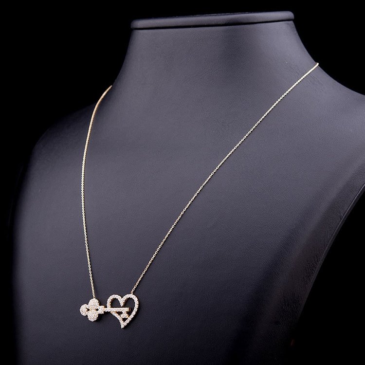 Золотое колье "Ключик и сердце" с фианитами кол00795 - 2 Золотое колье "Ключик и сердце" с фианитами кол00795 от ювелирного магазина Оникс - 2