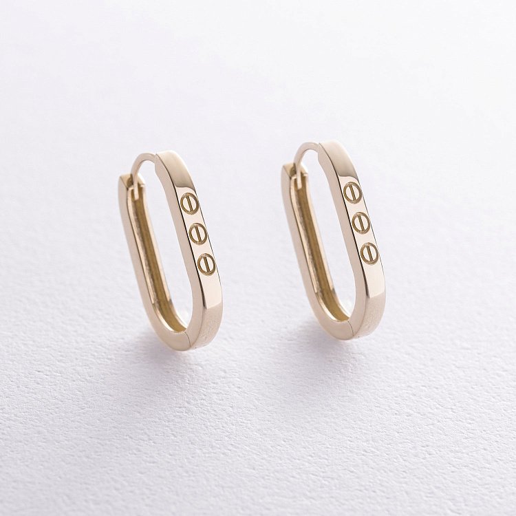 Сережки "Love" у жовтому золоті с08606 від ювелірного магазину Онікс