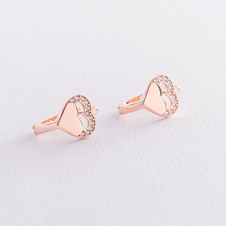 Золотые серьги "Сердечки" (фианиты) с07387 от ювелирного магазина Оникс