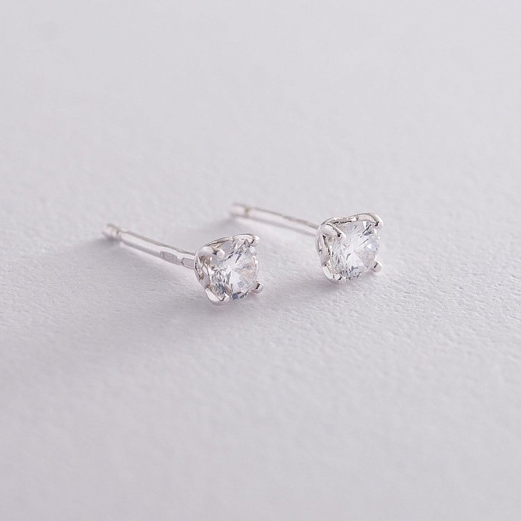 Срібні сережки - пусети з фіанітами 122655 від ювелірного магазину Онікс - 2