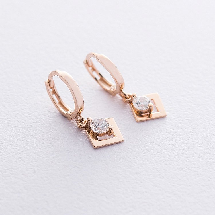 Золоті сережки Ромбики з фіанітами с06538 від ювелірного магазину Онікс