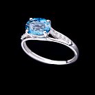 Золотое кольцо с голубым топазом и фианитами 14034074 от ювелирного магазина Оникс