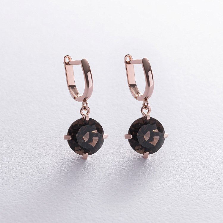 Золотые серьги "Влечение" (дымчастый кварц) с08604 от ювелирного магазина Оникс