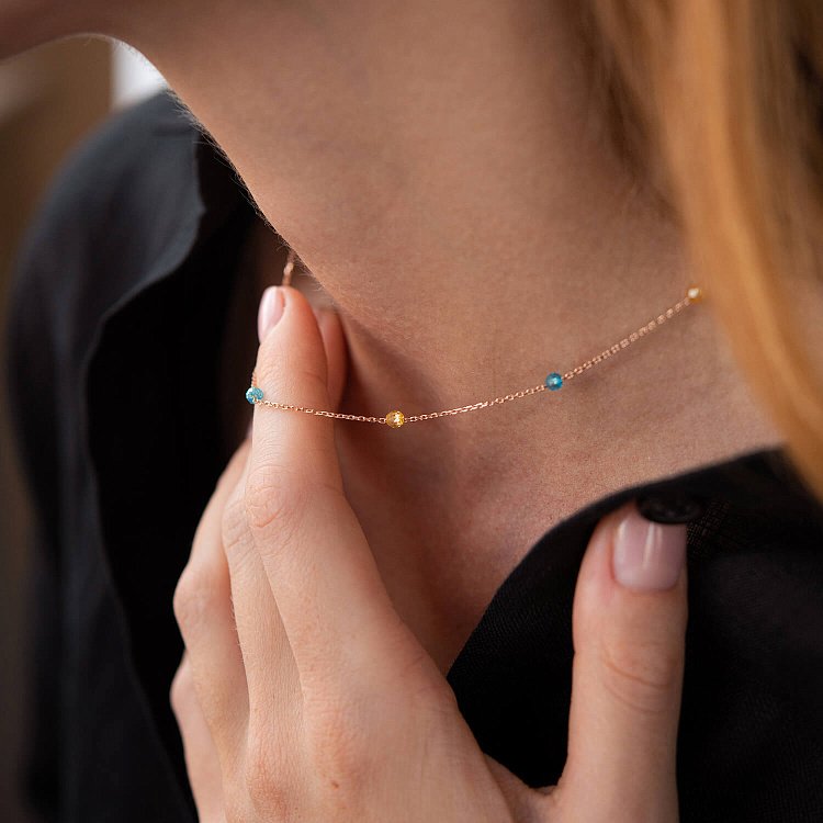 Кольє "Вільна" у червоному золоті (блакитні та жовті фіаніти) кол02249 від ювелірного магазину Онікс - 1