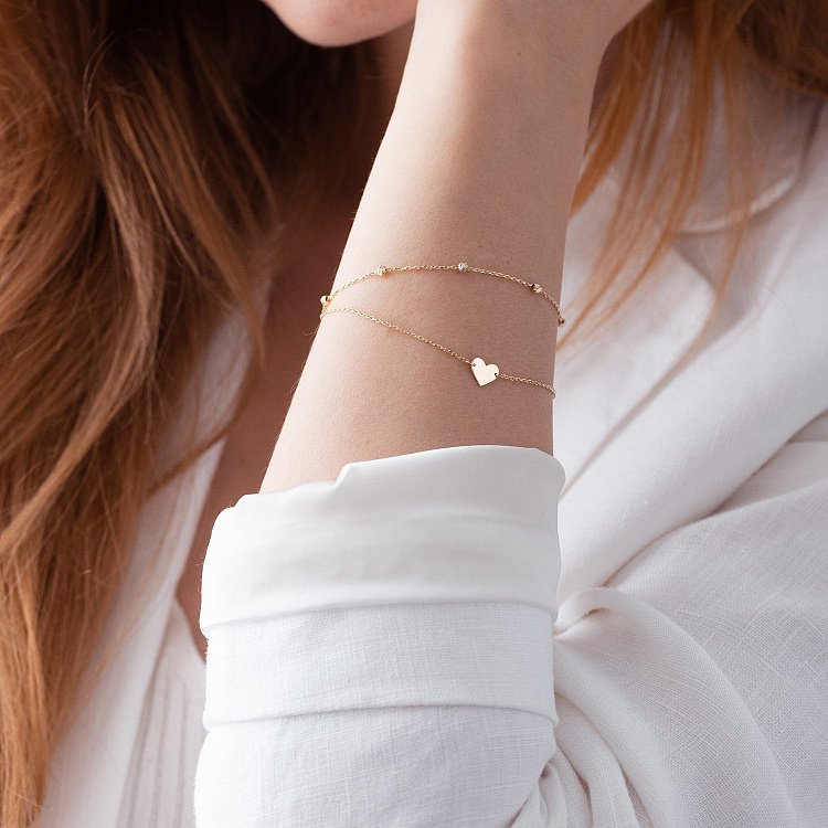 Подвійний золотий браслет "Сердечко" б05098 від ювелірного магазину Онікс - 1