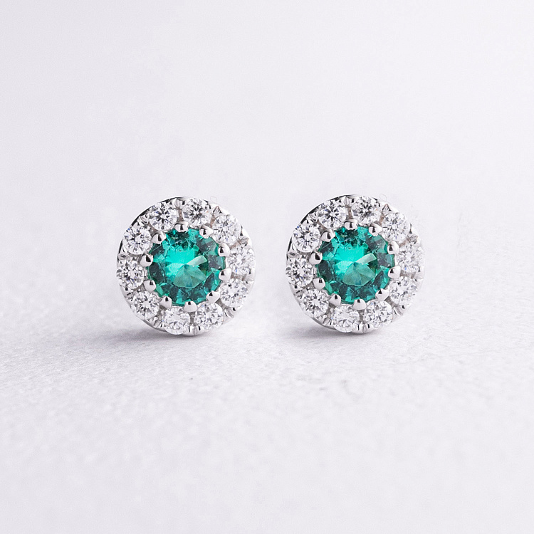 Серьги - пусеты в белом золоте (бриллианты, изумруды) сб0716mi от ювелирного магазина Оникс