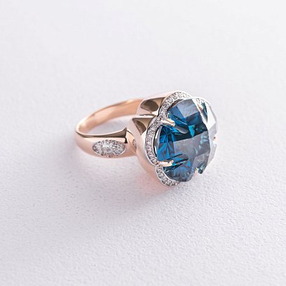 Золота каблучка "Квітка" (Лондон топаз)  к1005k