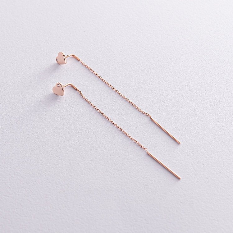 Золоті сережки - протяжки "Сердечки" з фіанітами с08256 від ювелірного магазину Онікс - 1