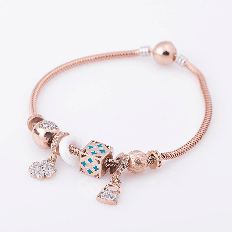 Золотой браслет с шармами (фианиты) б02761 от ювелирного магазина Оникс