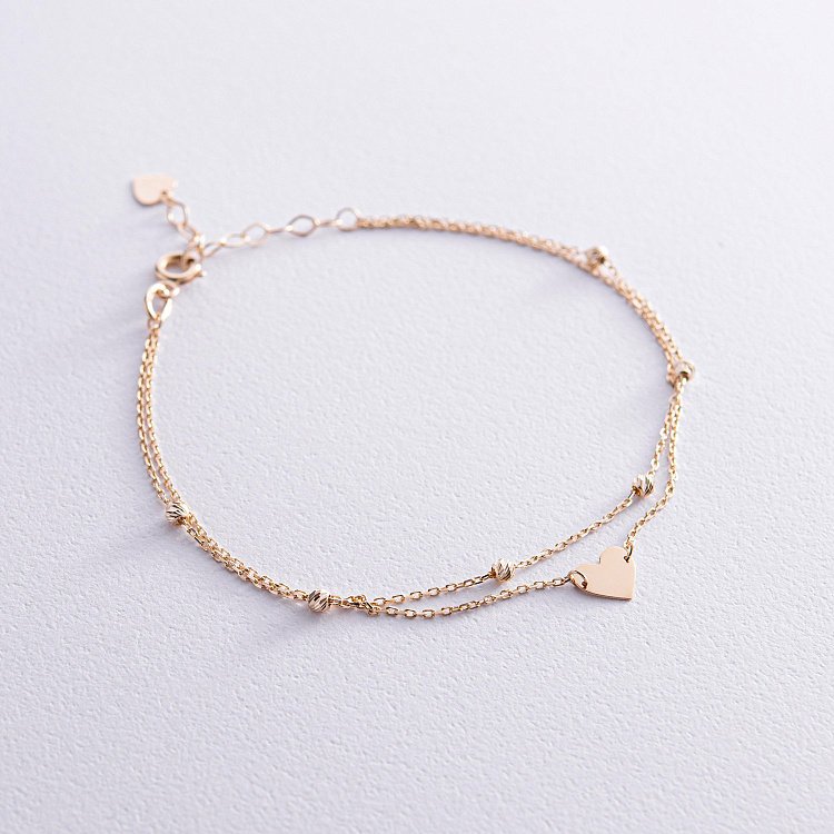 Подвійний золотий браслет "Сердечко" б05098 від ювелірного магазину Онікс