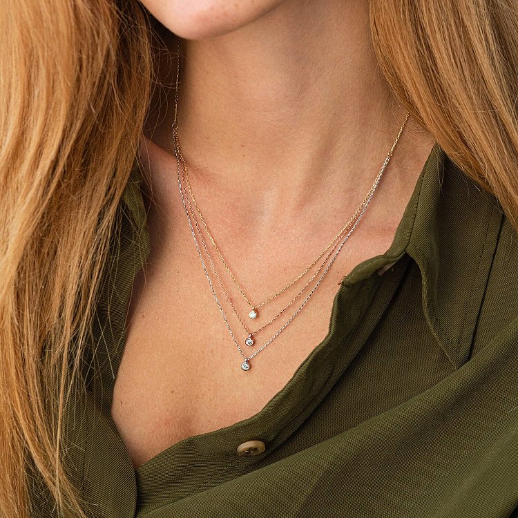 Потрійне золоте кольє з фіанітами кол02310 від ювелірного магазину Онікс - 1