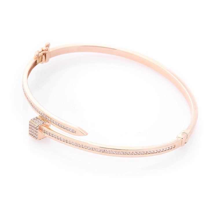 Жорсткий золотий браслет (фіаніти) б03763 від ювелірного магазину Онікс