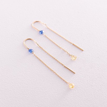 Золоті сережки - протяжки "Українка" (блакитні та жовті фіаніти) с08103