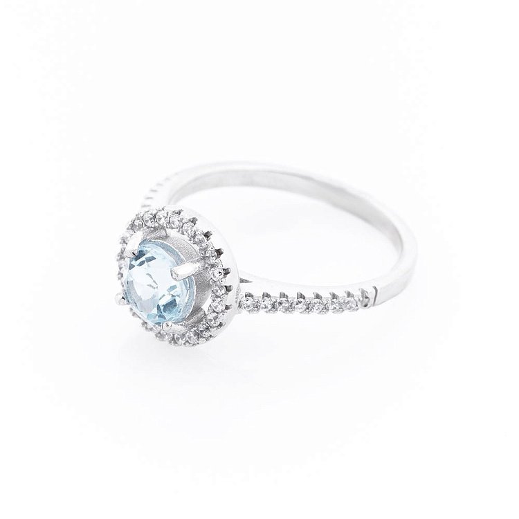 Жіноча каблучка з блакитним топазом (фіаніти) 111428 від ювелірного магазину Онікс - 1