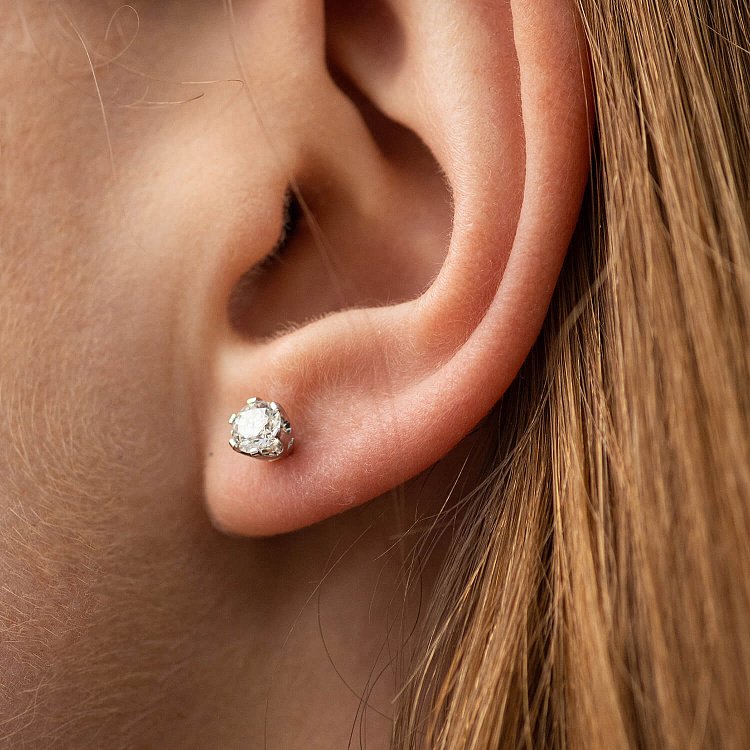 Золотые серьги - пусеты с бриллиантами 36861121 от ювелирного магазина Оникс - 1