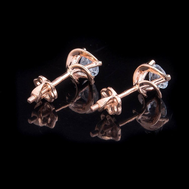 Золоті сережки-пусети з блакитним топазом с01797 від ювелірного магазину Онікс - 2