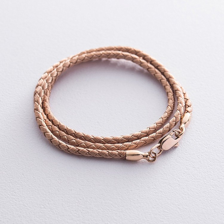 Шовковий золотий шнурок з золотою гладкою застібкою (3 мм) кол00935 від ювелірного магазину Онікс