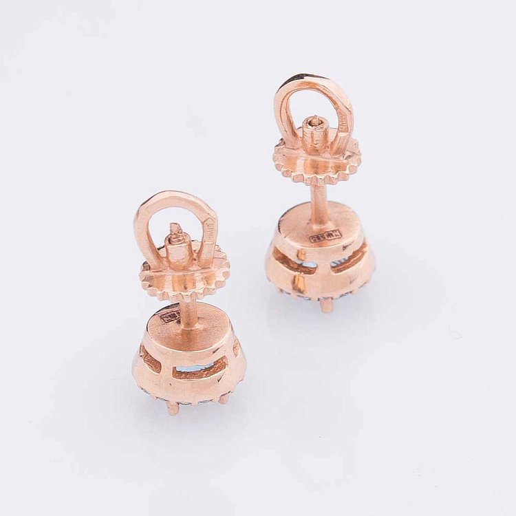 Золоті сережки-пусети з блакитним топазом і фіанітами с489 від ювелірного магазину Онікс - 1