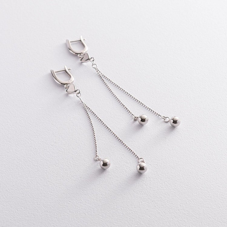 Срібні сережки з підвісками кульками 123031 від ювелірного магазину Онікс