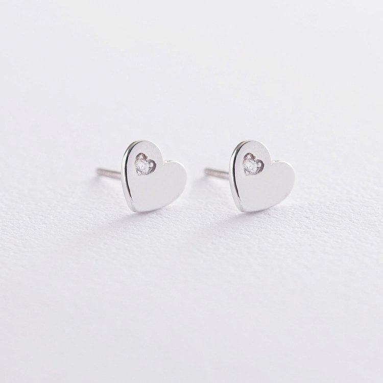 Золотые серьги "Сердечки" с фианитами с06722 от ювелирного магазина Оникс