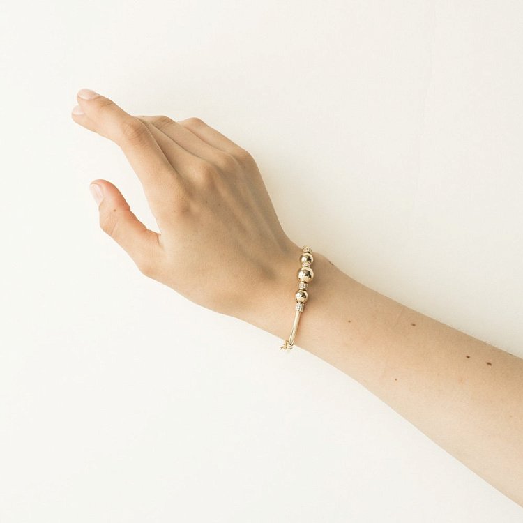 Золотий браслет з кульками б02887 від ювелірного магазину Онікс - 6