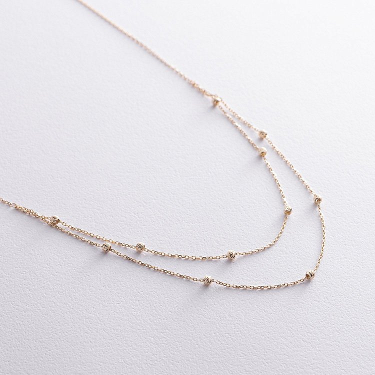 Двойное колье "Шарики" в желтом золоте кол02453 от ювелирного магазина Оникс