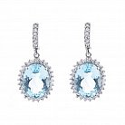 Жіночі сережки з блакитним топазом (фіаніти) 121329 от ювелирного магазина Оникс