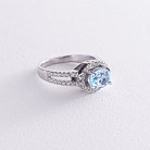 Серебряное помолвочное кольцо с голубым топазом и фианитами 111457 от ювелирного магазина Оникс - 2