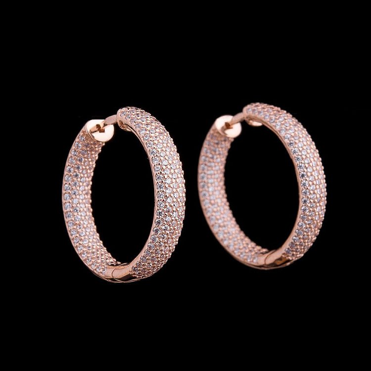 Золоті сережки "Кільця" з фіанітами с03792 від ювелірного магазину Онікс