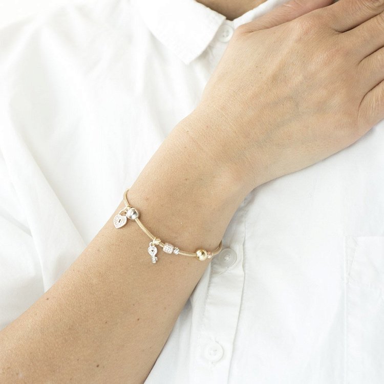 Золотий браслет "Сердечко з ключиком" (фіаніт) б04006 від ювелірного магазину Онікс - 3