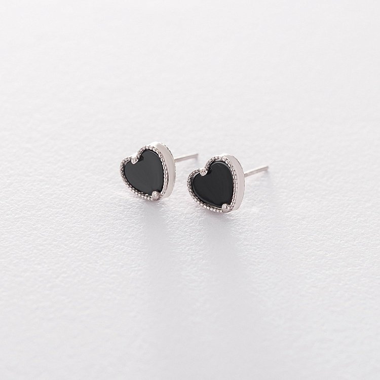 Срібні сережки - пусети "Сердечка" з оніксом 122483 від ювелірного магазину Онікс
