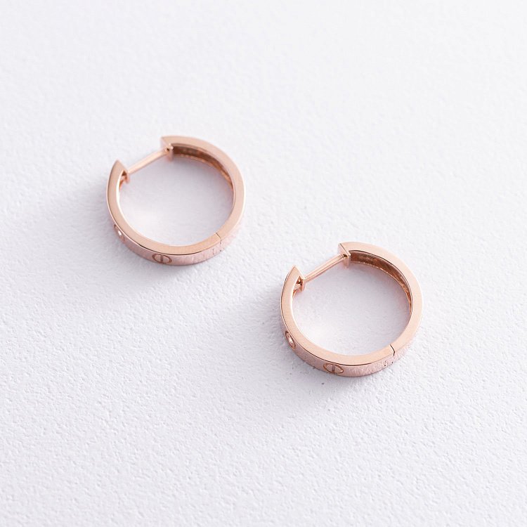 Золоті сережки - кільця "Love" з фіанітами с07493 від ювелірного магазину Онікс - 2