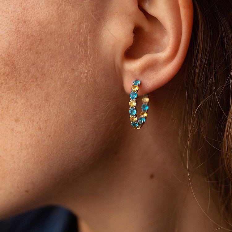 Срібні сережки - кільця з блакитними і жовтими фіанітами OR126610 від ювелірного магазину Онікс - 1