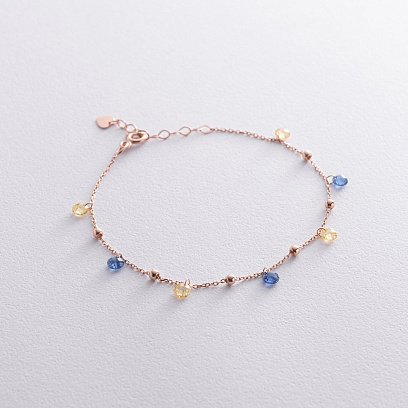 Золотий браслет "Незалежна" з кульками (сині та жовті фіаніти) б05326