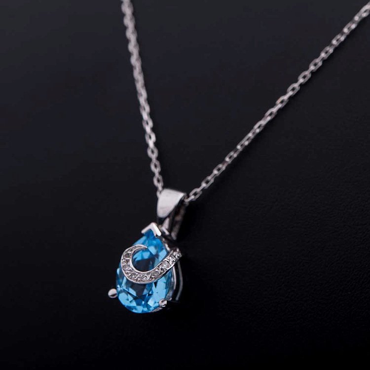 Золоте кольє з блакитним топазом і діамантами кол375 від ювелірного магазину Онікс