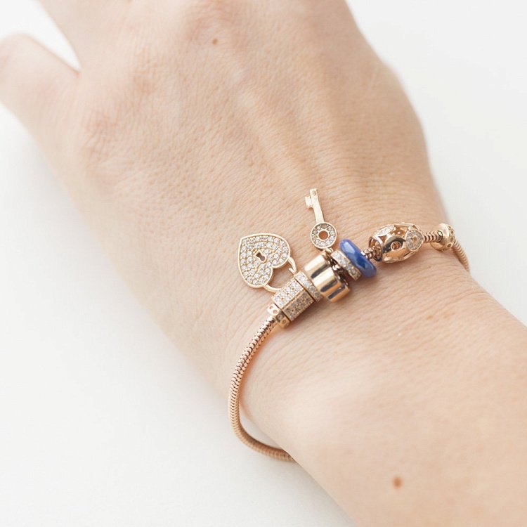 Золотий браслет з підвісками б02739 від ювелірного магазину Онікс - 2