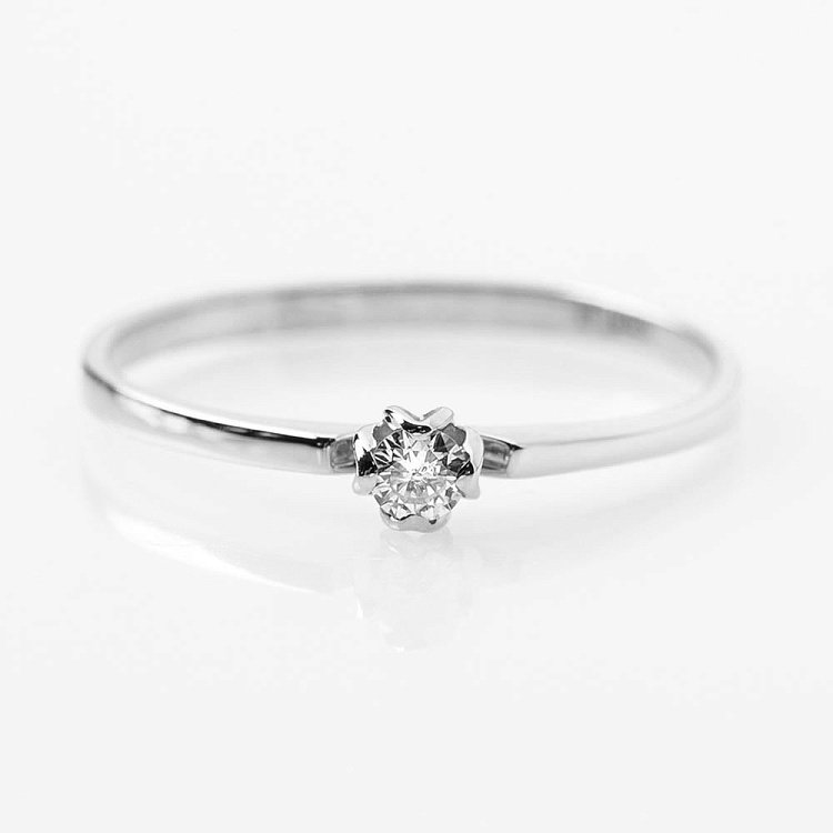 Золота заручальна каблучка з діамантом R0696б від ювелірного магазину Онікс