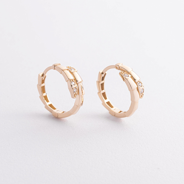 Серьги - кольца "Змеи" в желтом золоте (фианиты) с09527 от ювелирного магазина Оникс