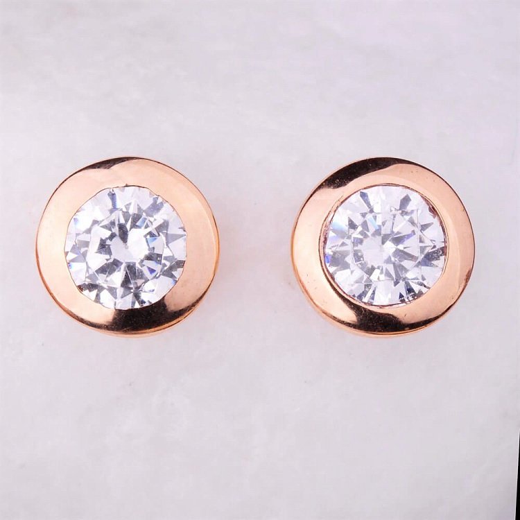 Золотые серьги-гвоздики с фианитами с01090 от ювелирного магазина Оникс - 1