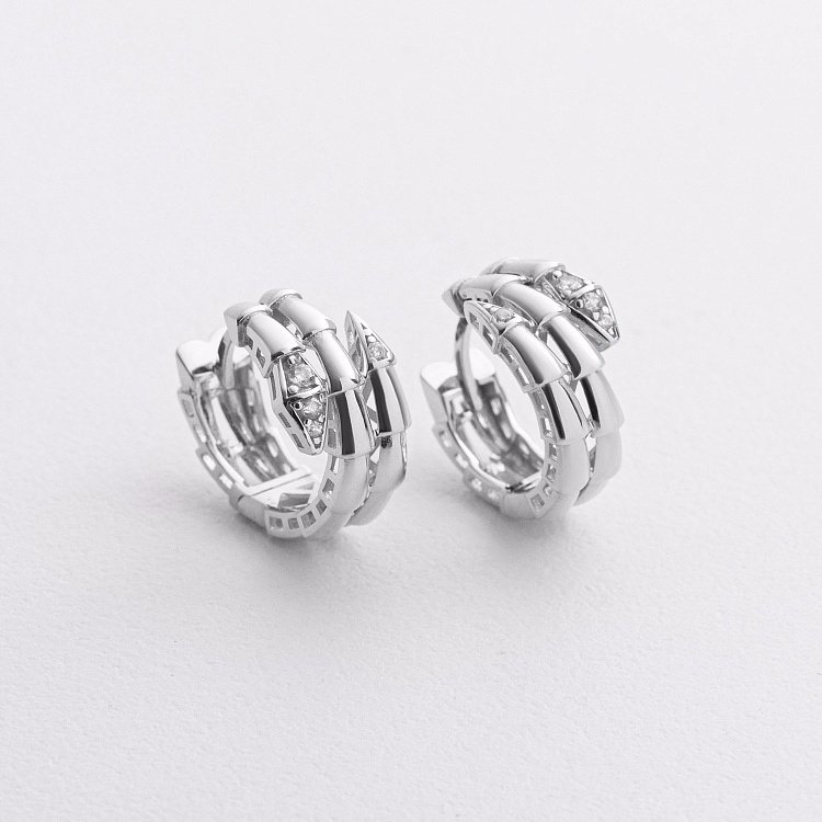 Сережки - кільця "Змії" у білому золоті (фіаніти) с09337 від ювелірного магазину Онікс