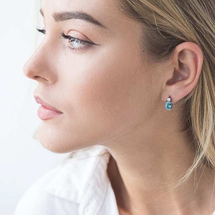 Золоті сережки з блакитним топазом і фіанітами с04180 від ювелірного магазину Онікс - 3