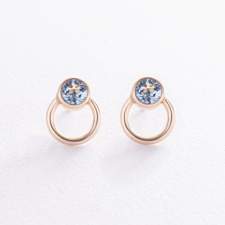 Сережки - пусети "Ейпріл" з топазами (жовте золото) с08225 від ювелірного магазину Онікс