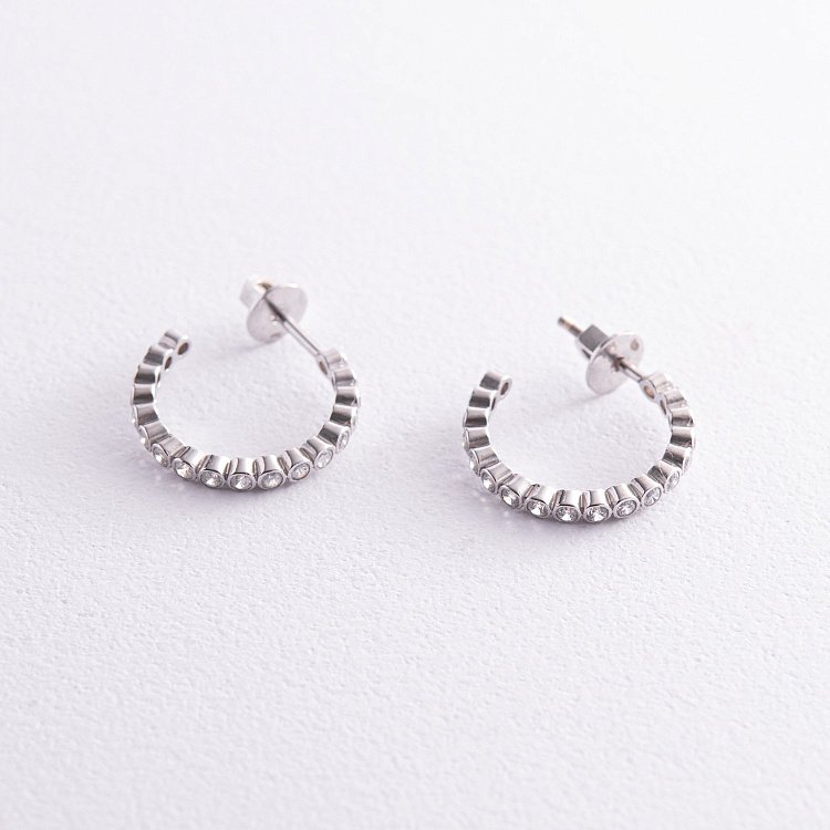 ﻿Срібні сережки - пусети з фіанітами 4911 від ювелірного магазину Онікс