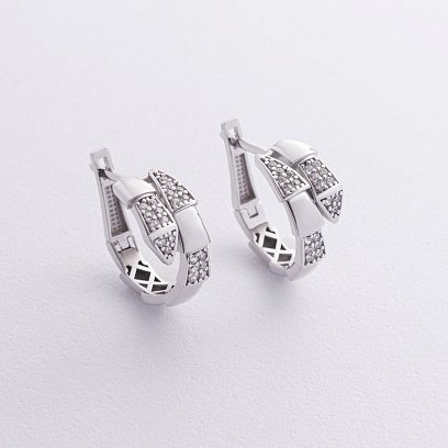 Серьги "Змеи" с фианитами (белое золото) с09053