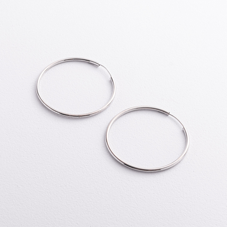 Серьги - кольца в серебре 123522 от ювелирного магазина Оникс - 1