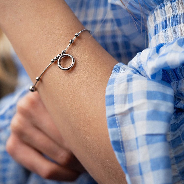 Серебряный браслет "Круговорот" с шариками 141621 от ювелирного магазина Оникс - 1